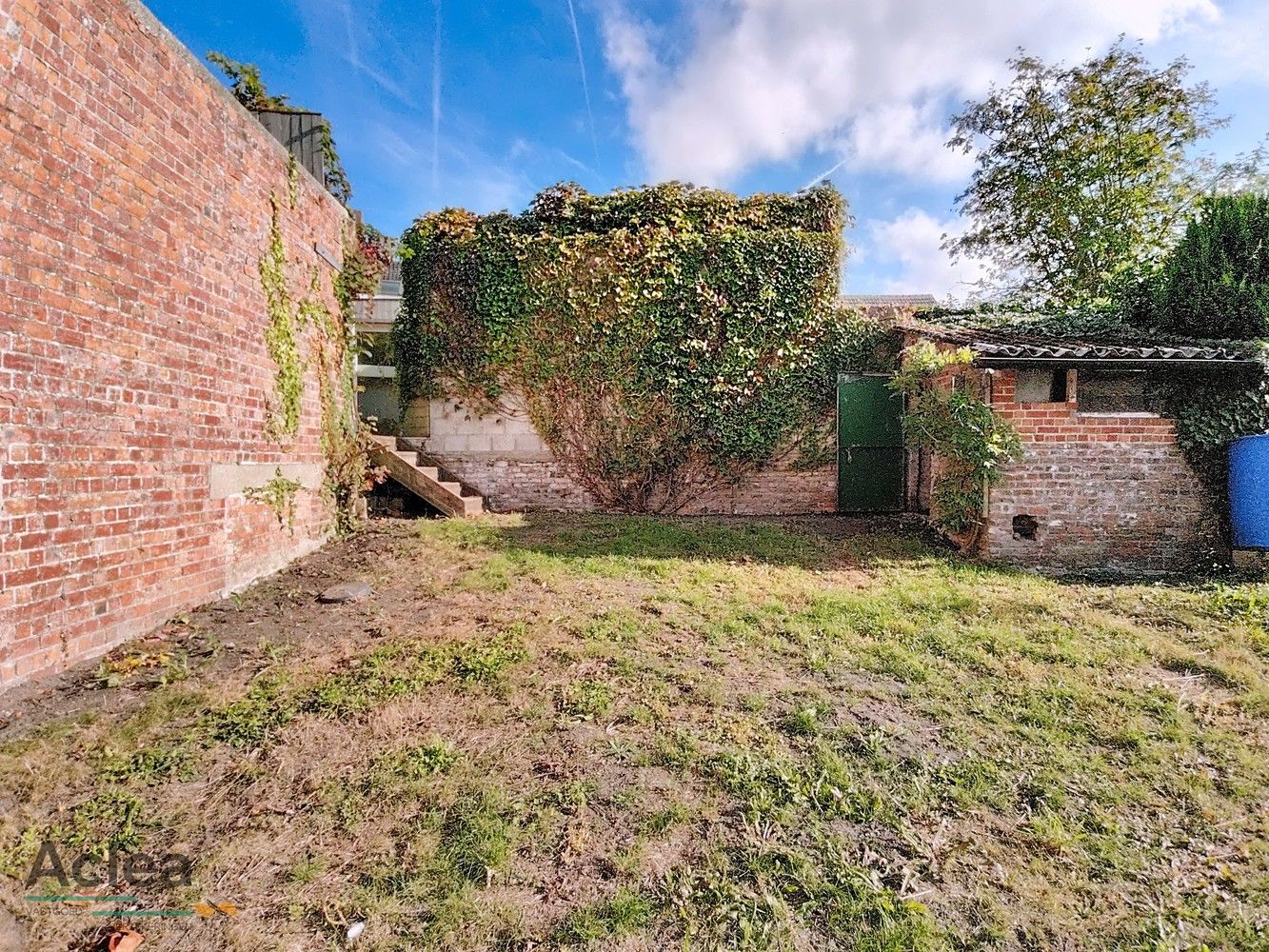 gelijkvloers appartement met terras en ruime tuin foto 19