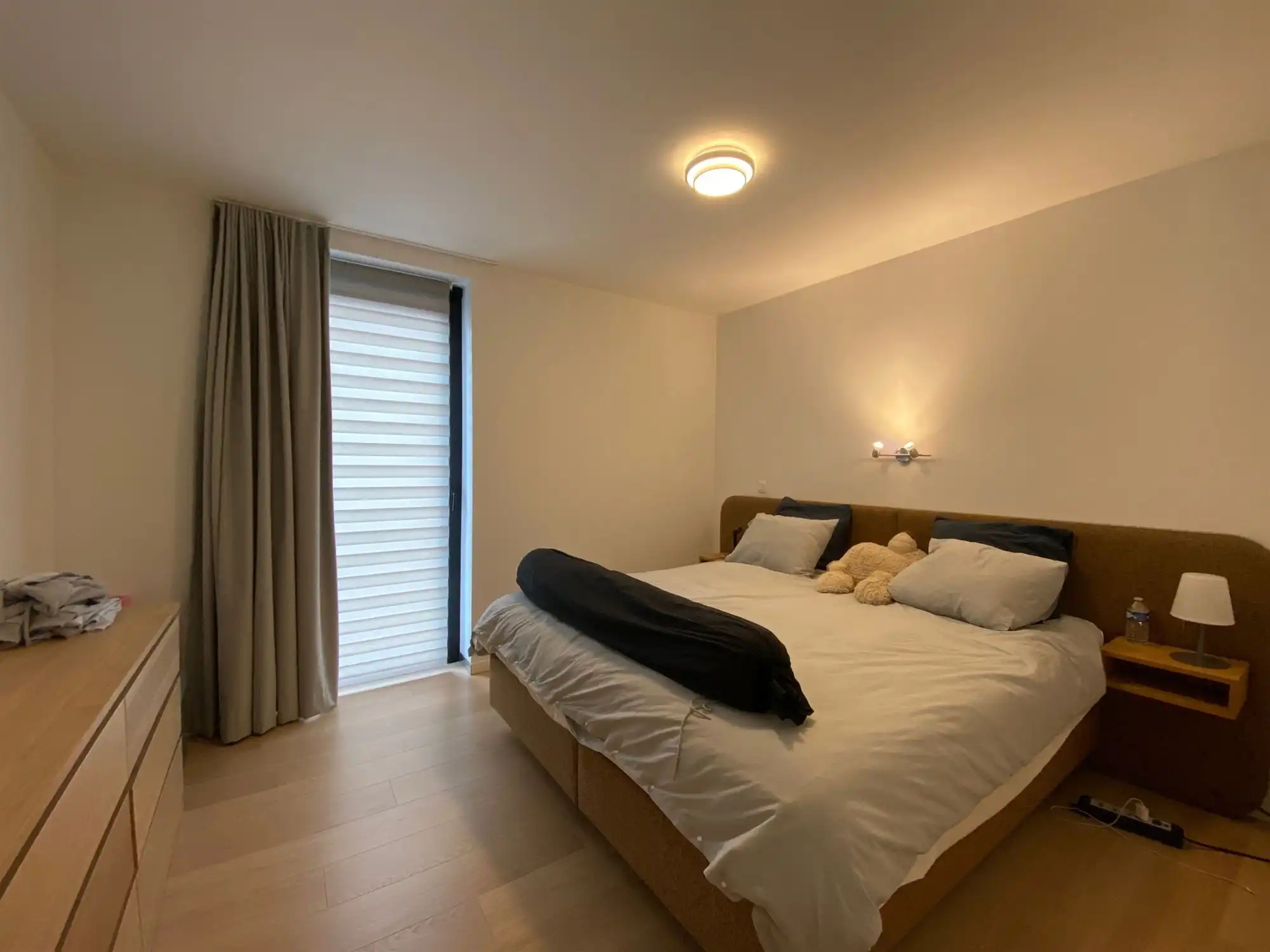 Knap en energiezuinig gelijkvloers appartement met 2-slpk, aangename tuin en een autostaanplaats foto 10