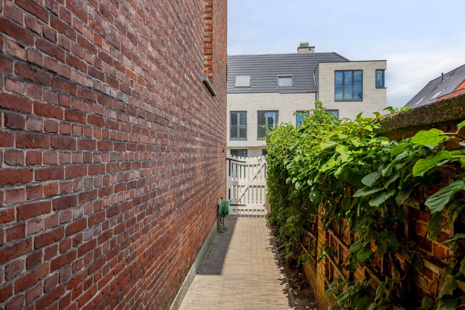 Instapklaar herenhuis met 4/5 slpks, centraal gelegen in Achterbos !  foto 40