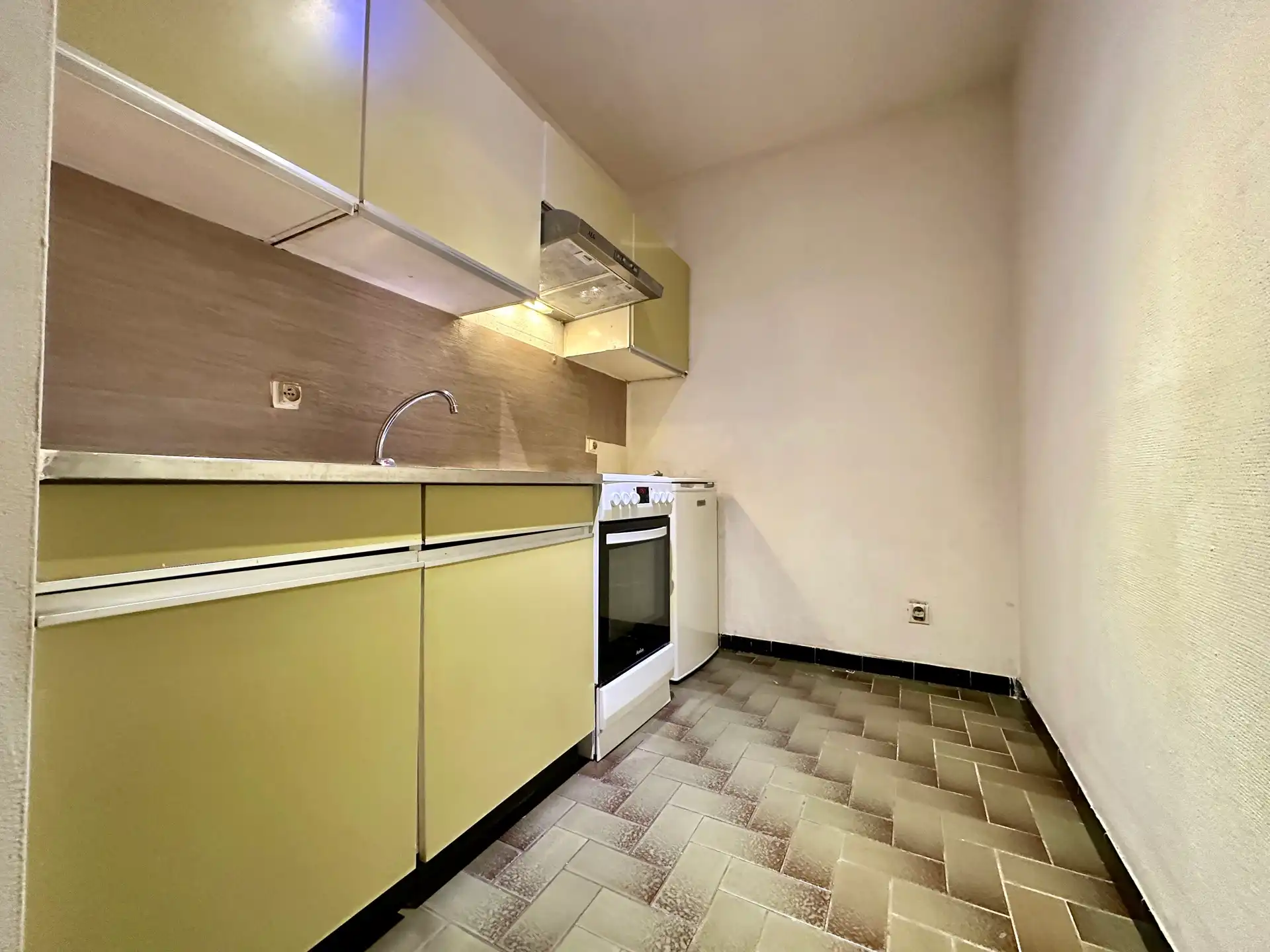 Gelijkvloers éénslaapkamerappartement met garage foto 6