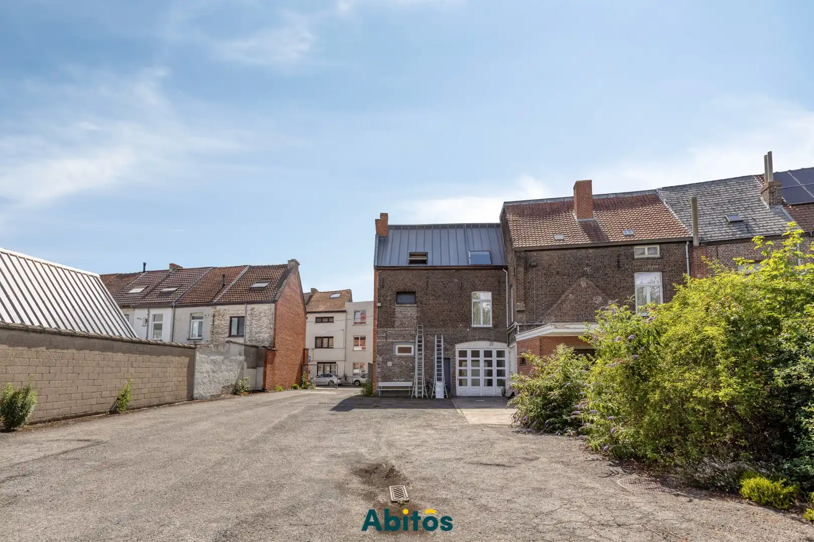 Opbrengsteigendom met 2 woningen, loods en garage in Gent foto 9