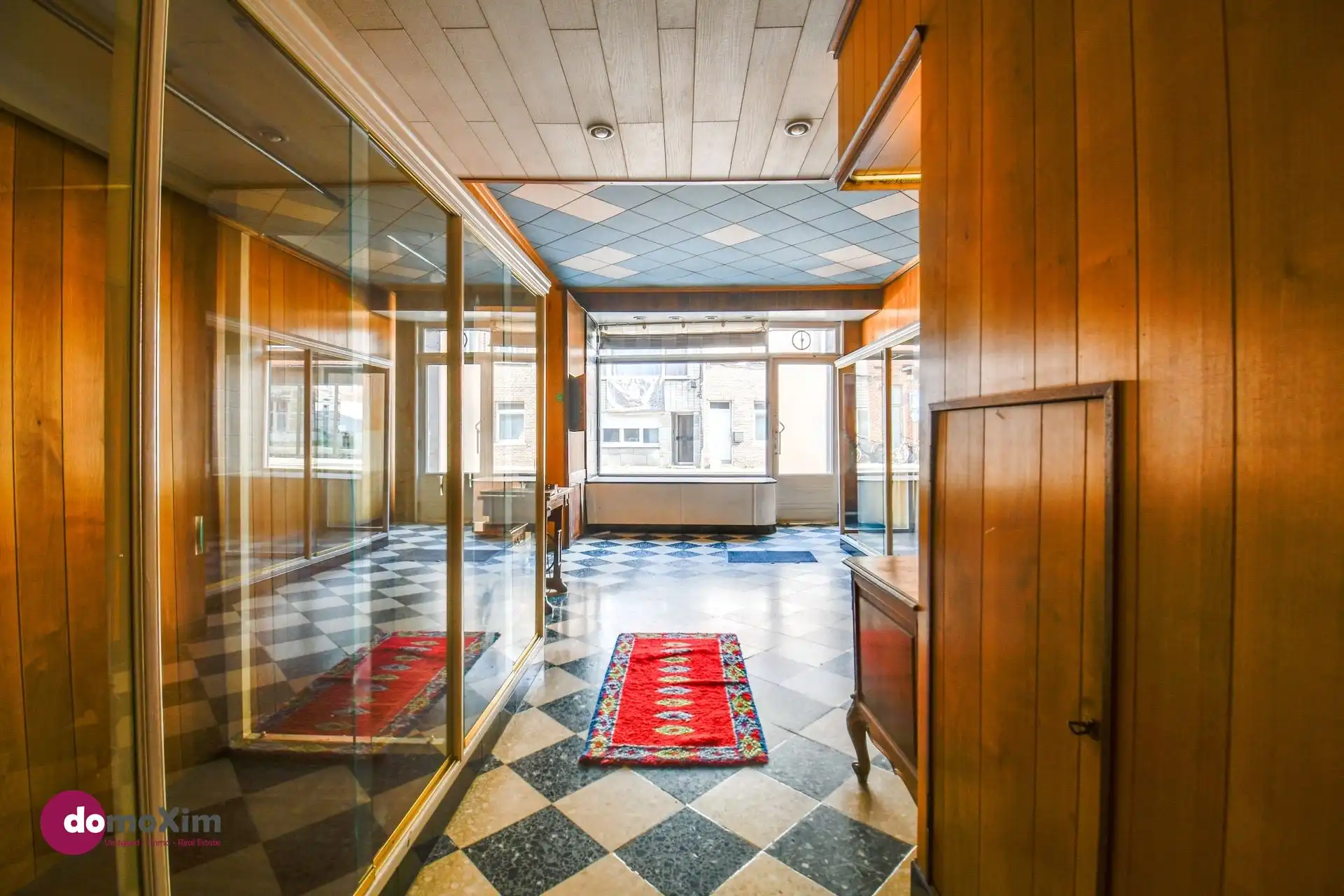 Te renoveren stadswoning met zuid-gerichte tuin en garage foto 5