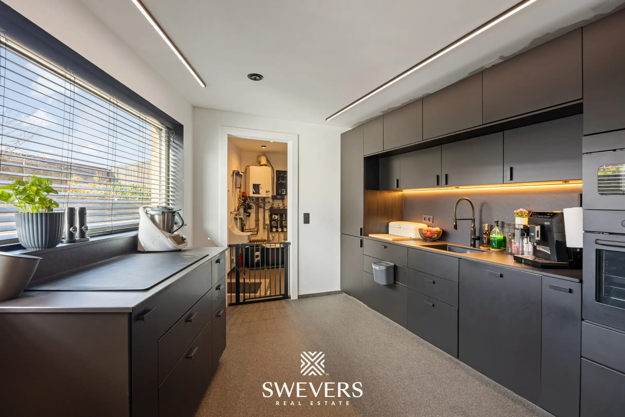 Instapklare en volledig gerenoveerde woning met tuin op rustige ligging in Leopoldsburg foto 9