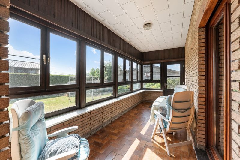 Gelijkvloerse woning met grote loods achteraan op 25are foto 16