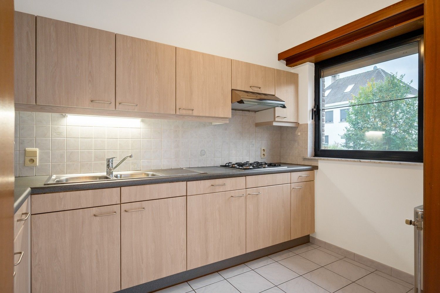 Ruim gelijkvloers appartement met tuin op toplocatie nabij centrum Vremde. foto 9