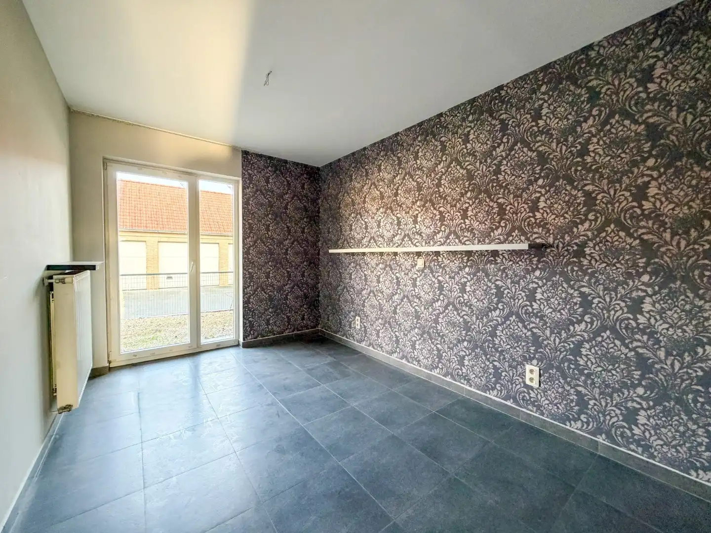 Lichtrijk gelijkvloers appartement met 2 slpk, garage en autostandplaats foto 13