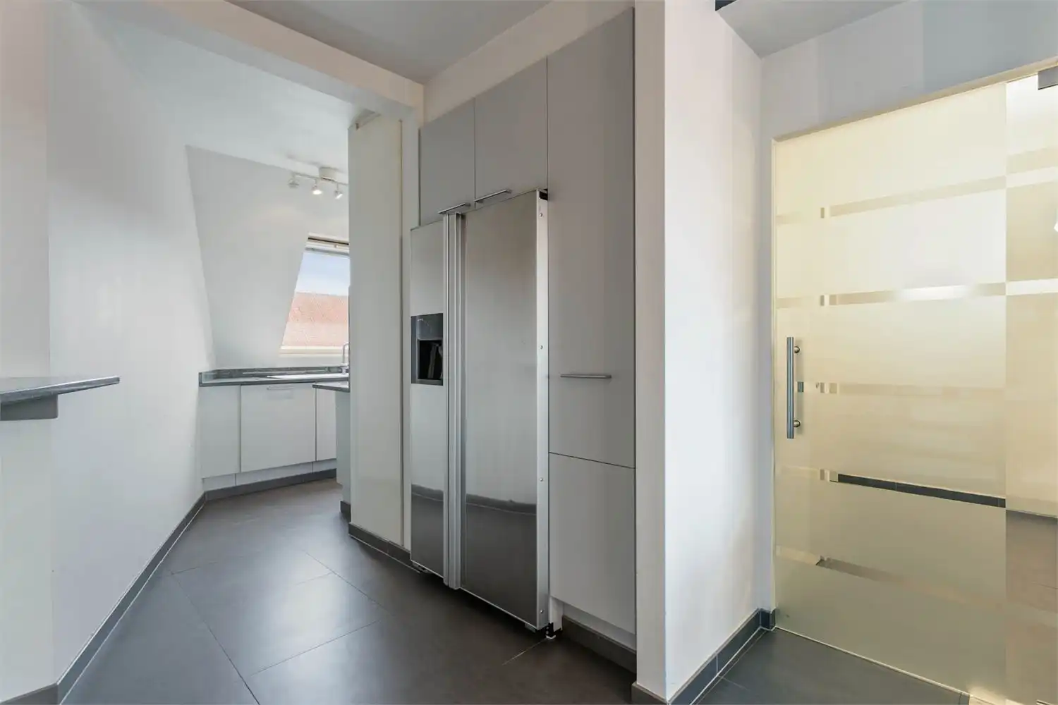 Instapklaar duplex dakappartement met terras in hartje Oostkamp foto 26