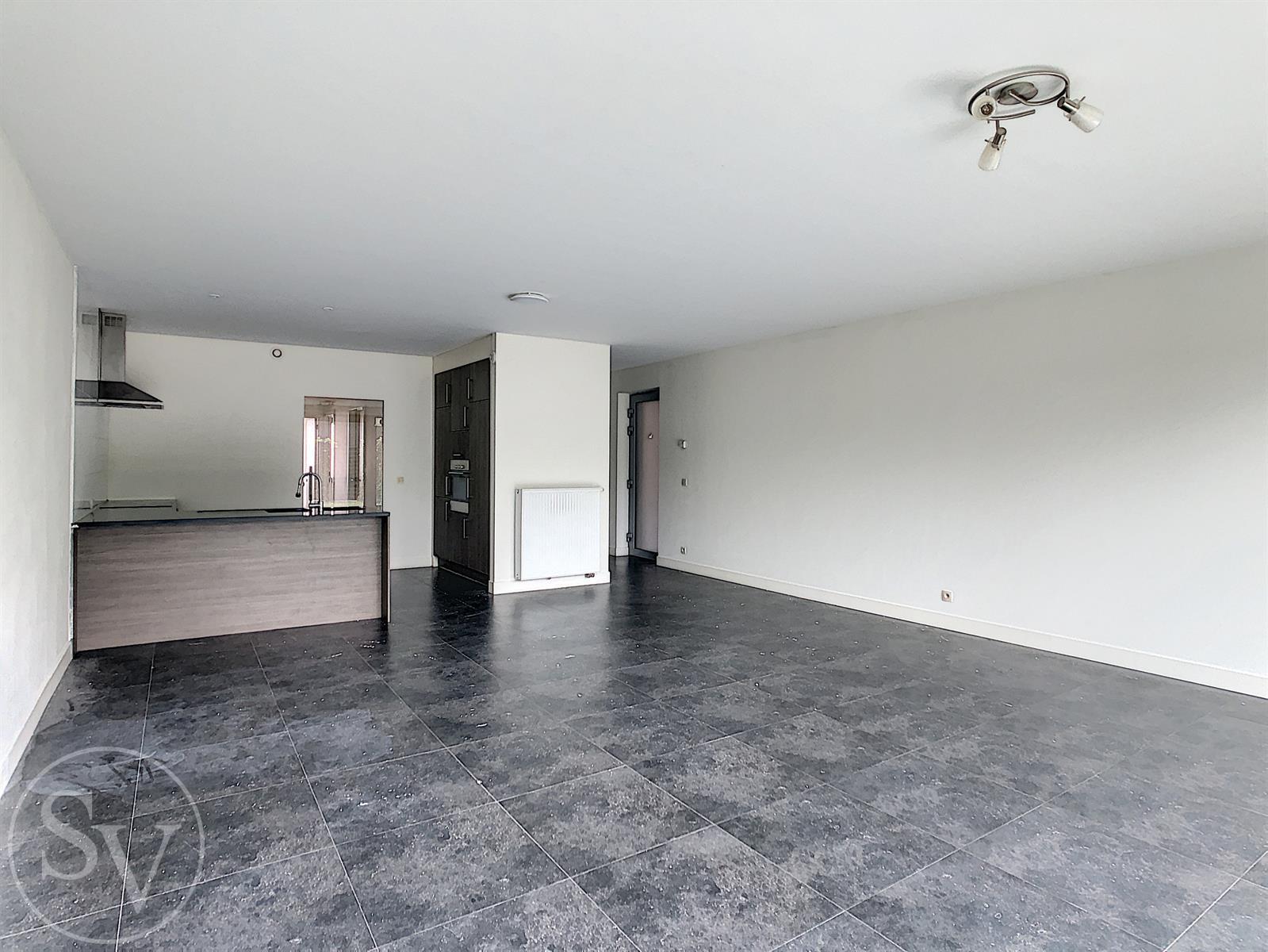 Gelijkvloers appartement, 2 slpk en tuin! foto 4