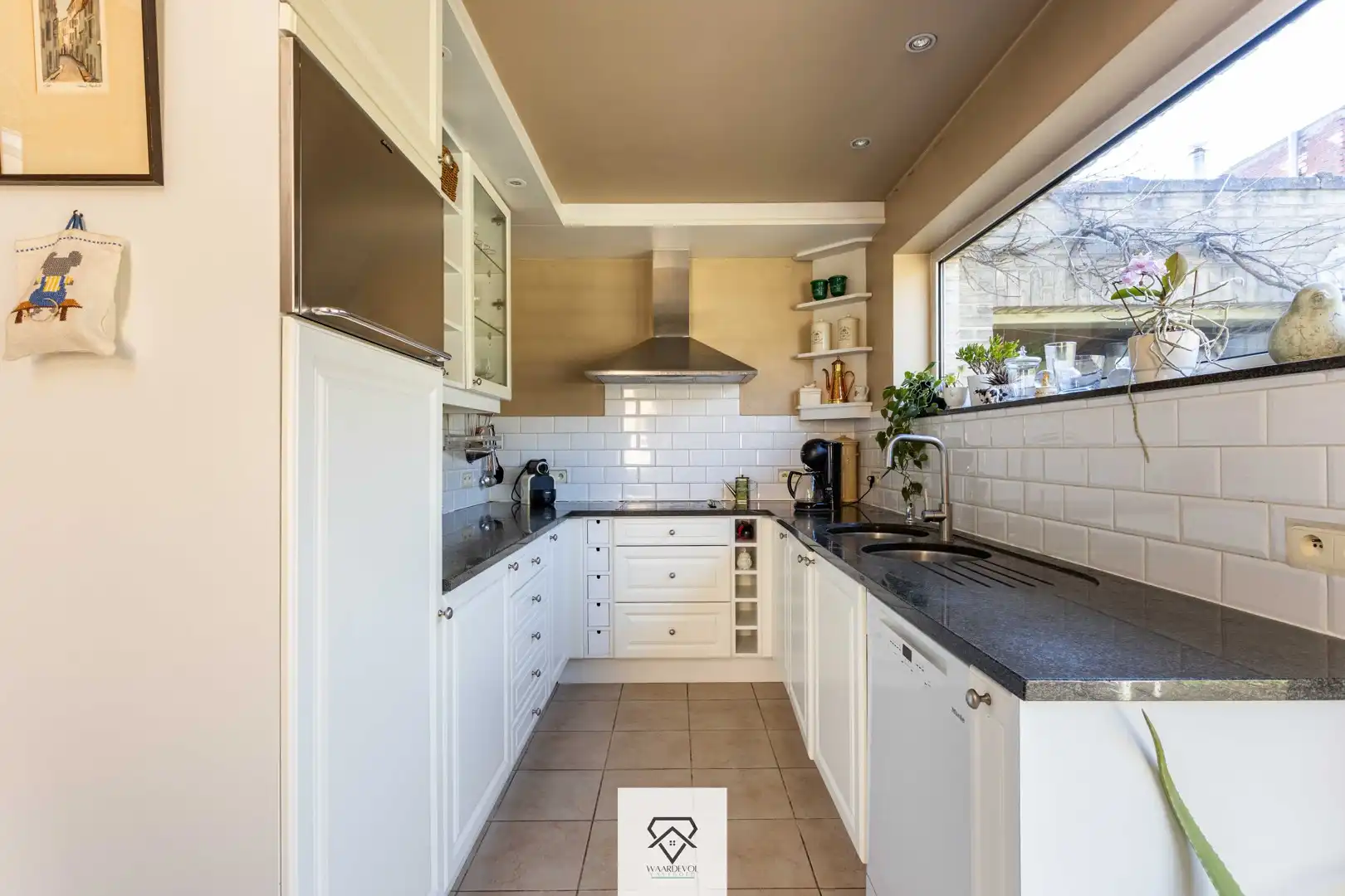 Gezinswoning met tuin en veel potentieel in het gegeerde Oostakker foto 11