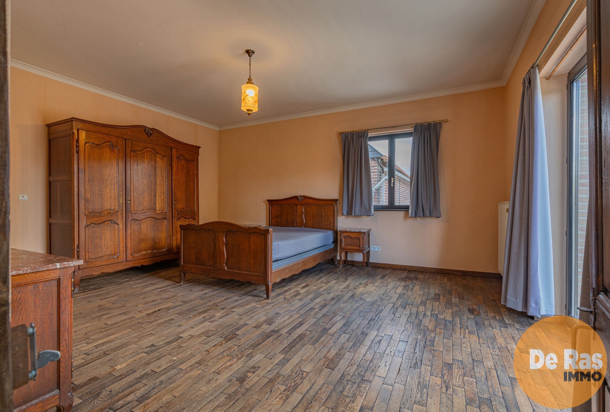 HERZELE - Degelijke 3-gevelwoning met tuin foto 12