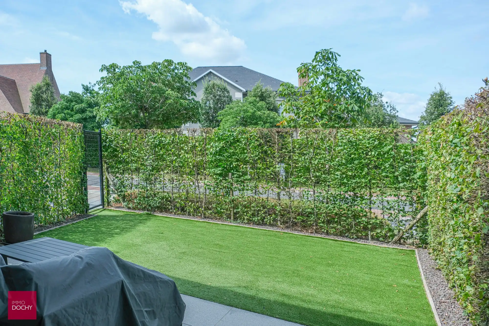 Gelijkvloers appartement met zongericht terras en tuin foto 2