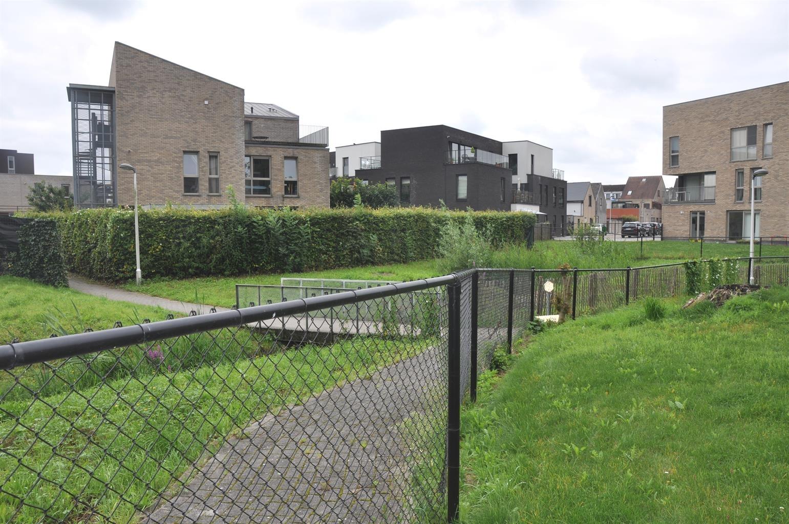 Duplex appartement met prachtige tuin in Opwijk centrum foto 15