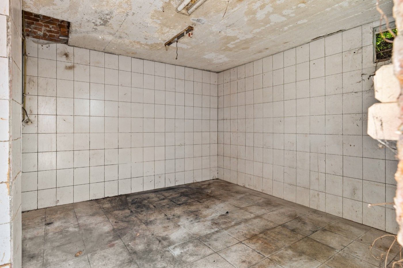 Ruime, volledig te renoveren woning met 4 slpk. en tuin in centrum Stabroek foto 18