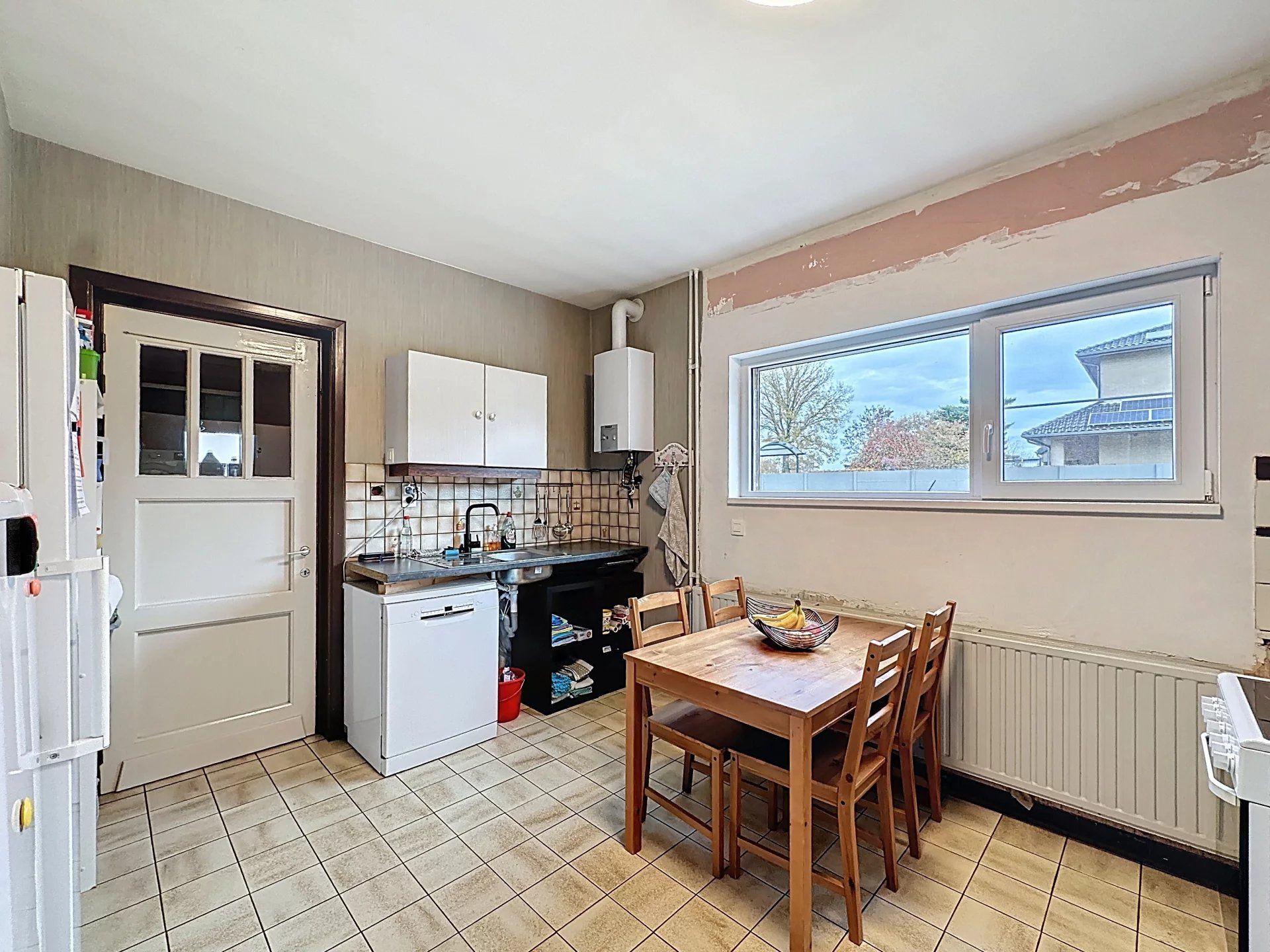 Op te frissen woning met 3 slaapkamers, op een groot perceel, eventueel 2 bouwplaatsen foto 11