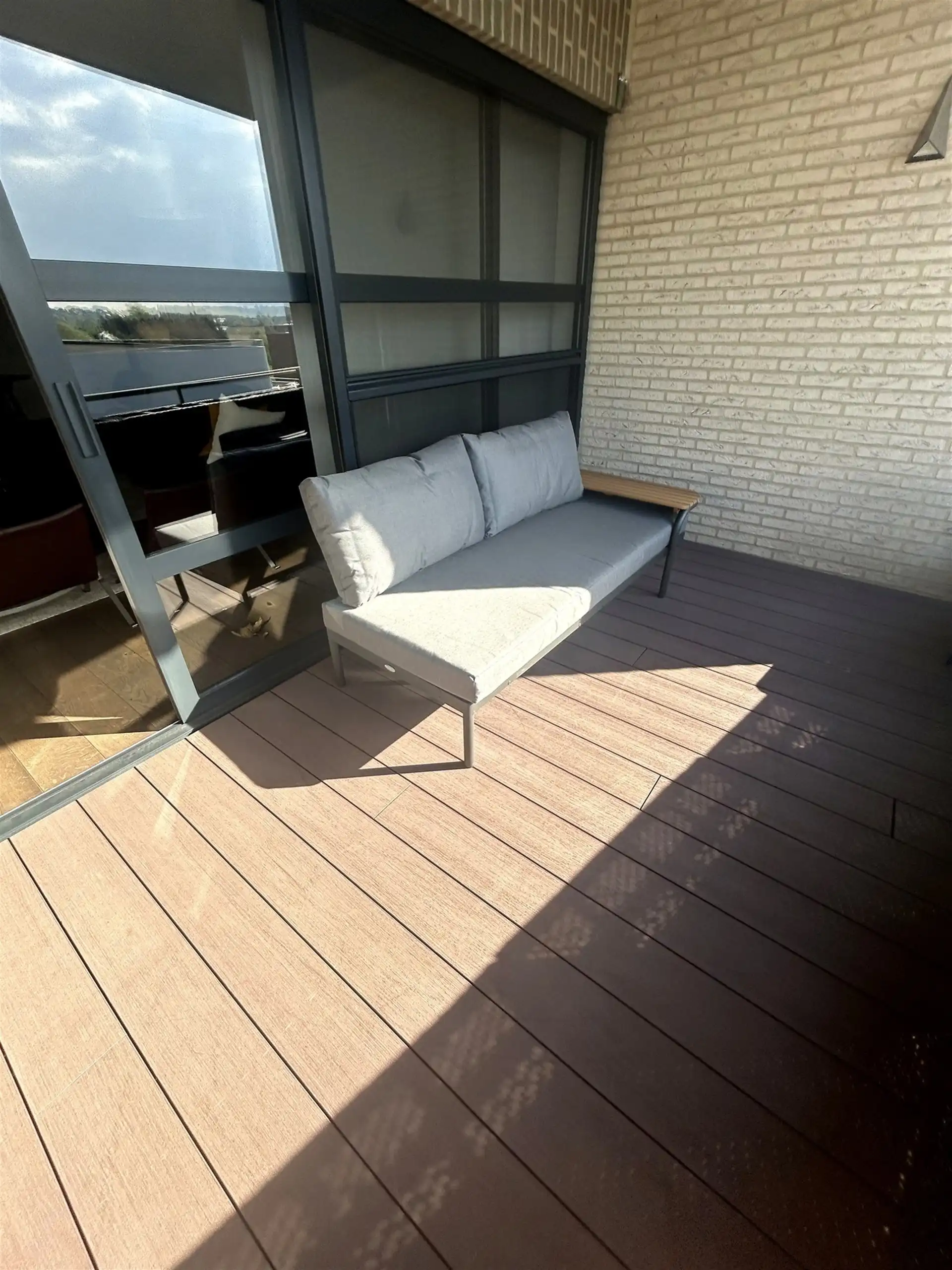 Stijlvol en lichtrijk appartement met twee terrassen en open uitzicht foto 11