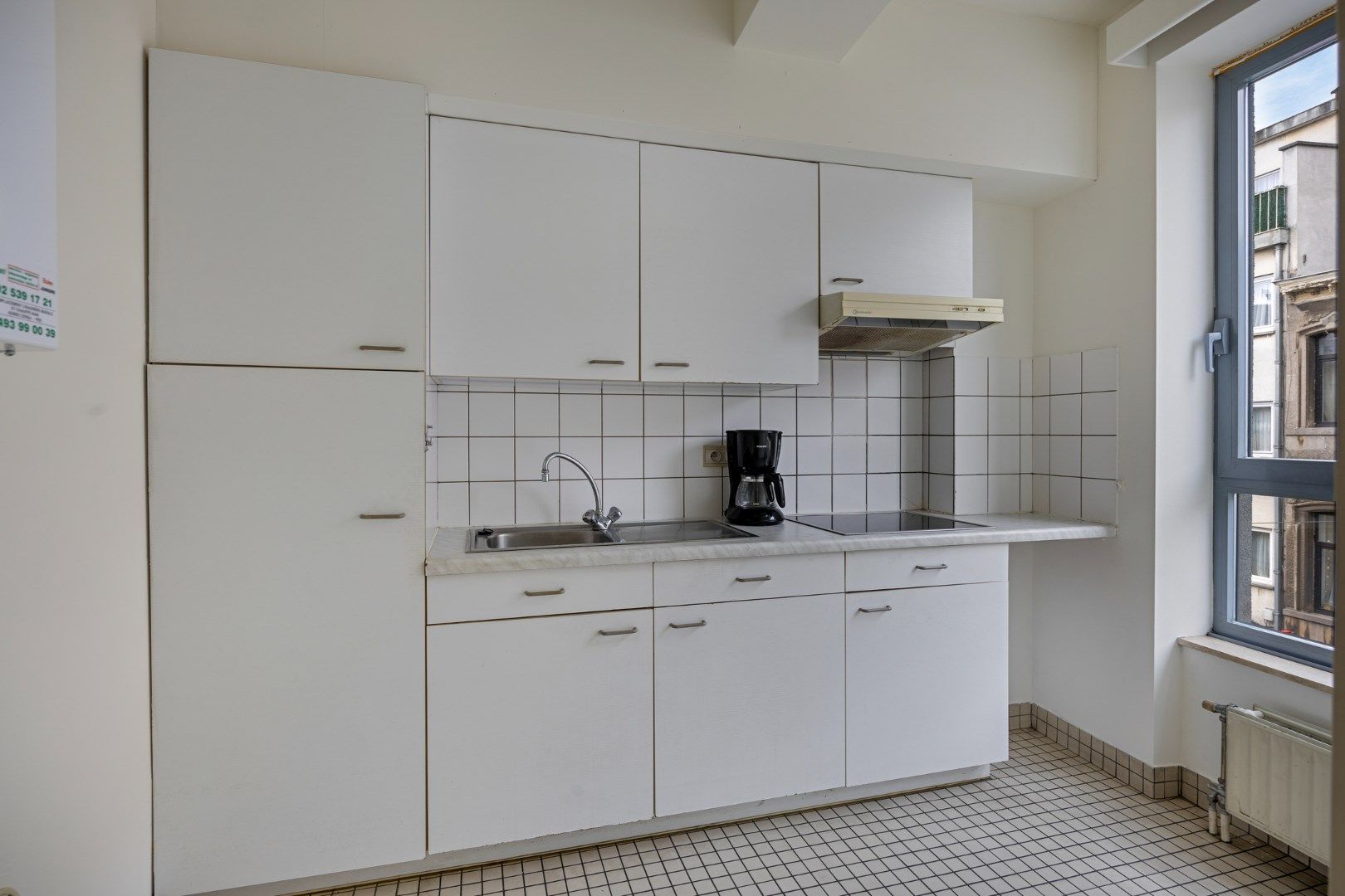 Op te frissen 1-slaapkamer-appartement in het bruisende Schaarbeek foto 9