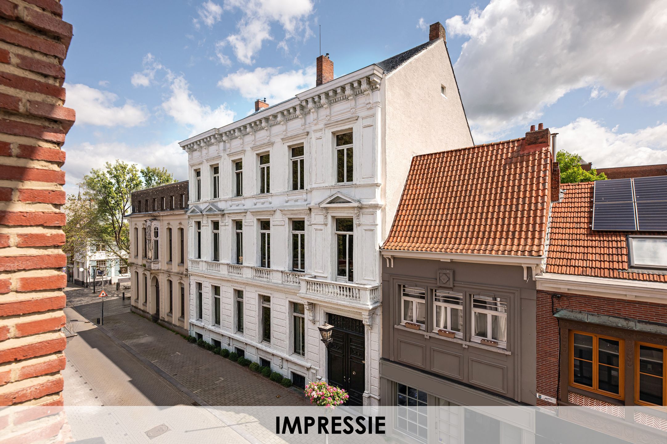 Penthouse van 264m² + terras in een uniek historisch kader foto {{pictureIndex}}