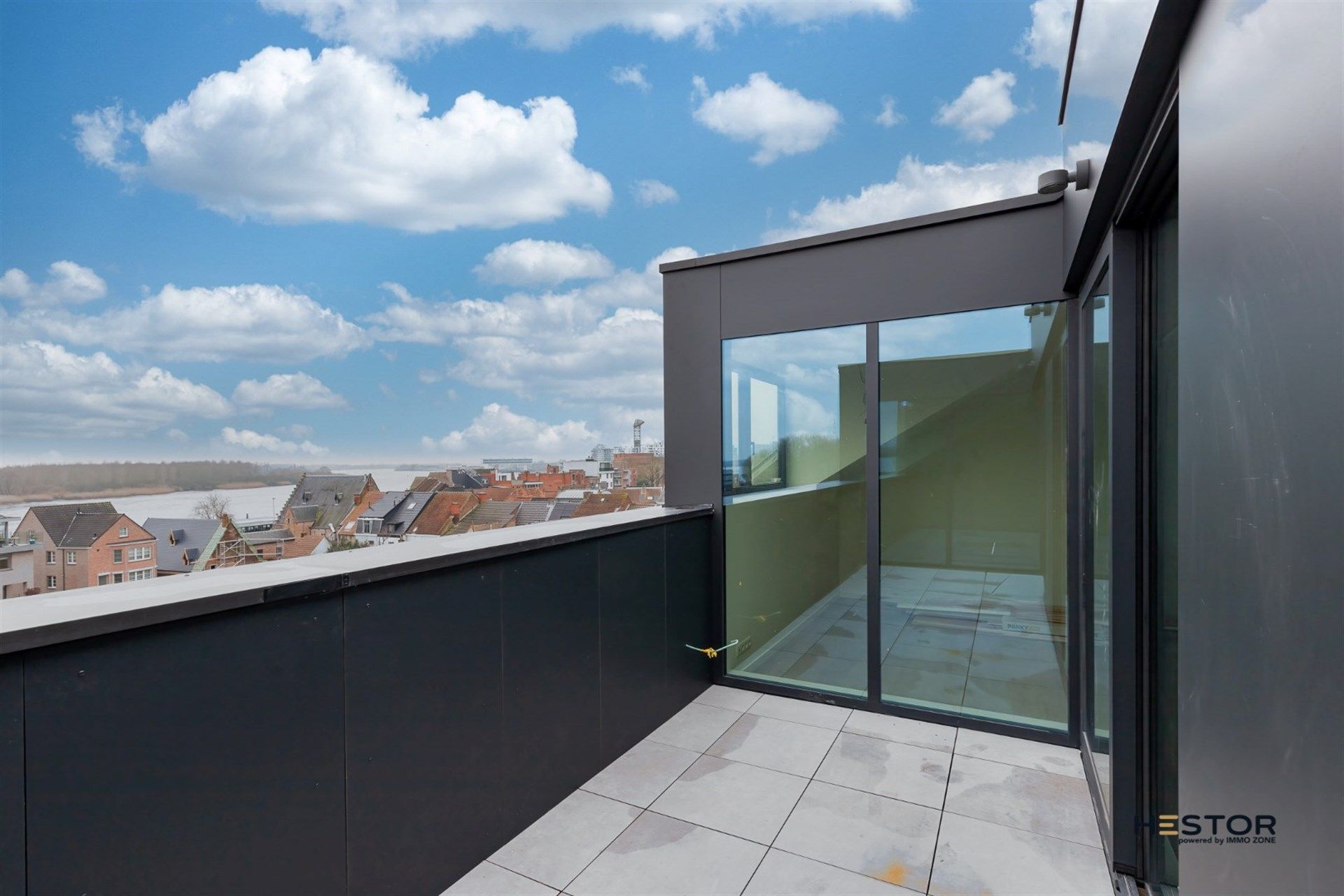 Gezellige penthouse met zicht op de Schelde foto {{pictureIndex}}