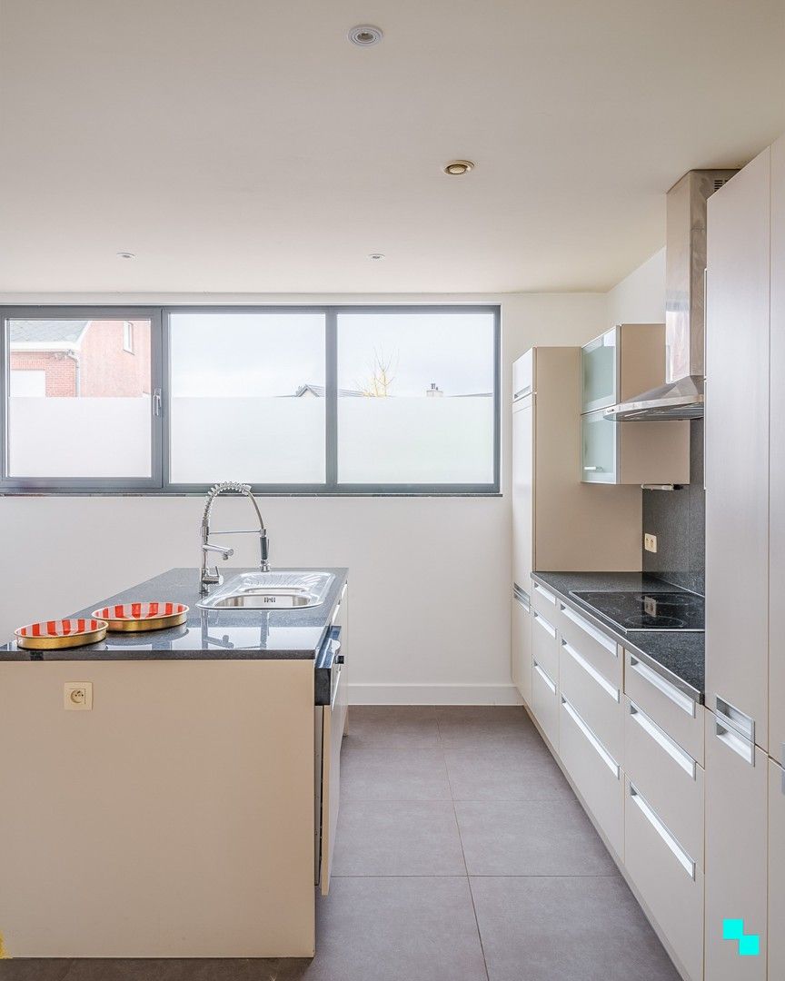 Gelijkvloers appartement met twee slaapkamers te Merelbeke dorp foto 11