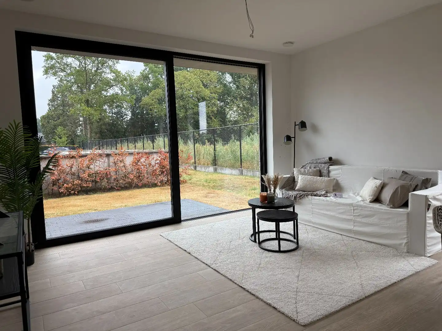 Laatste gelijkvloers 2-slpk appartement met tuin, 1 stpls en een kelder foto 4