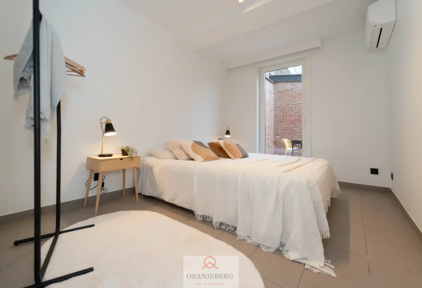 Lichtrijk gelijkvloers 2-slpk appartement met terras! foto 16