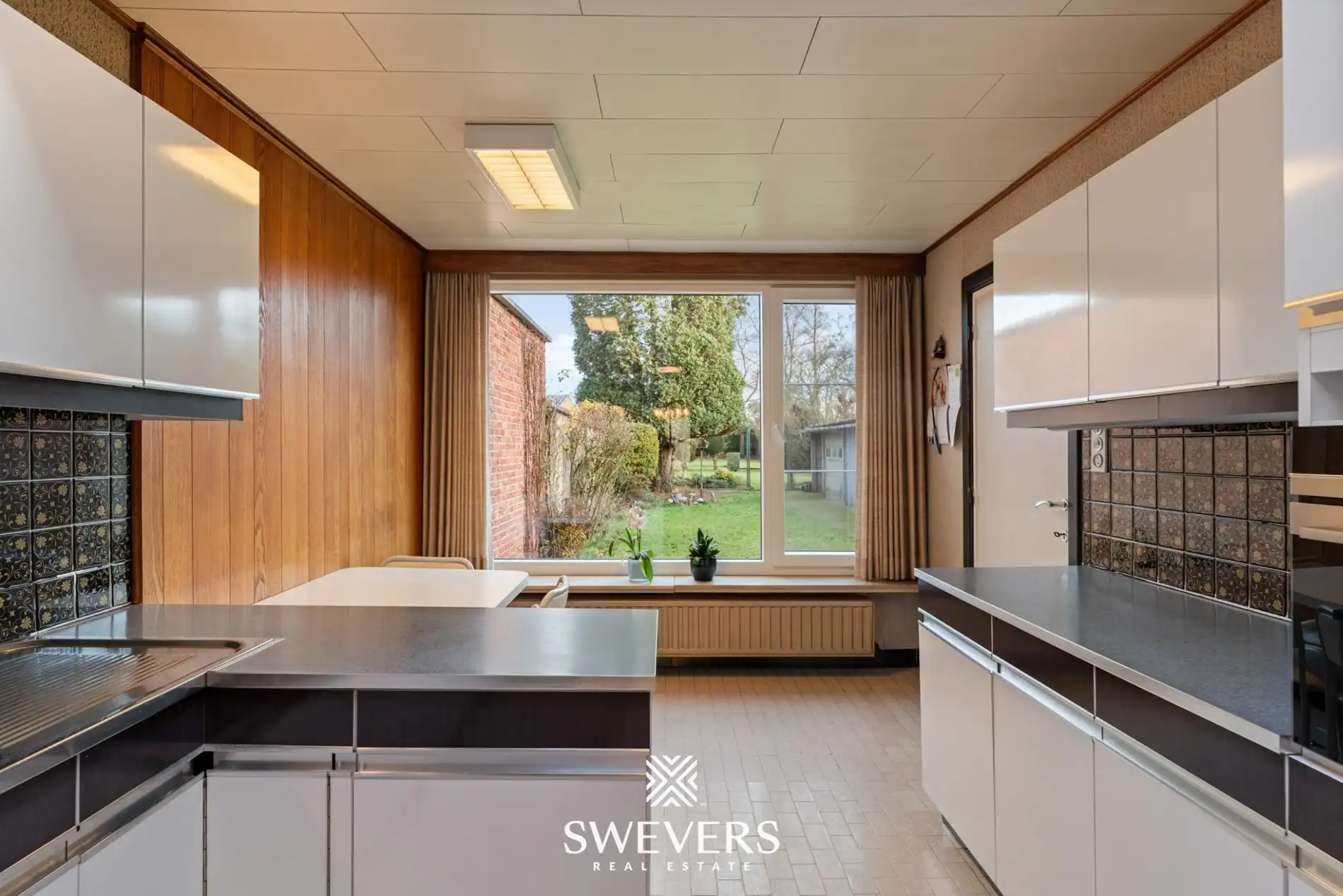 Woning met uitzonderlijk renovatiepotentieel op ruim en groen perceel nabij Zonhoven centrum foto 14