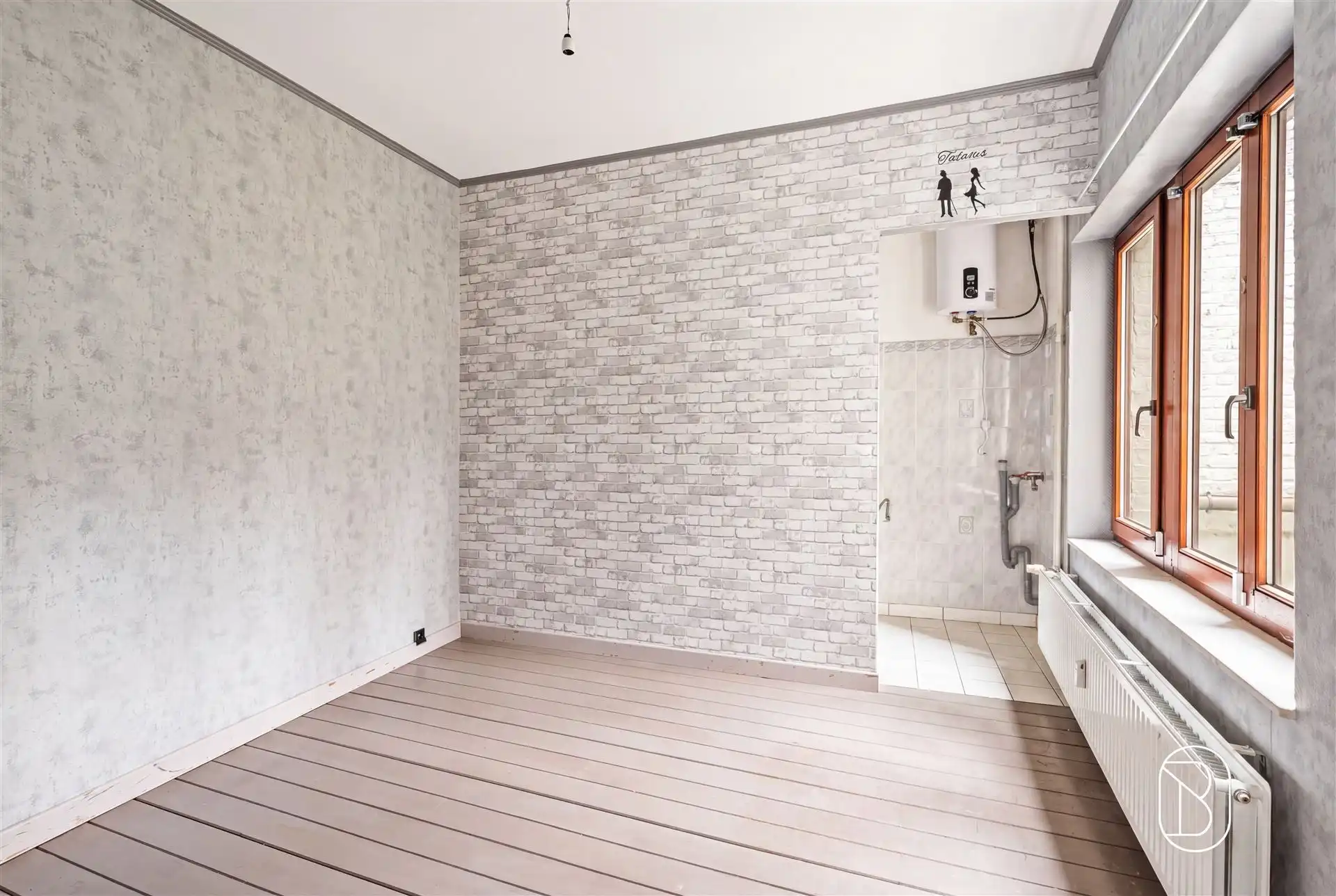 Opbrengsteigendom: handelsruimte en 2 appartementen foto 6