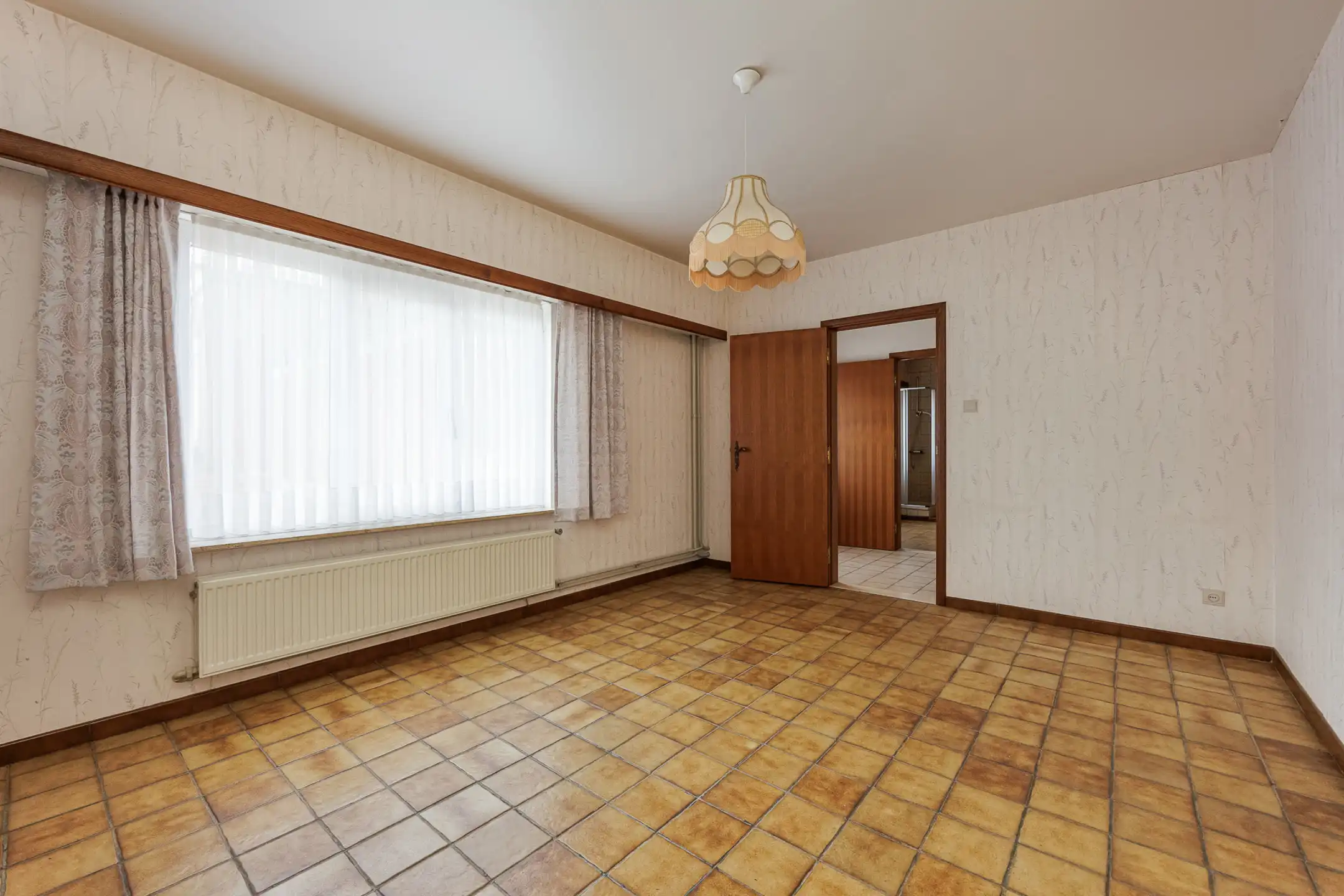 Te renoveren 3slpk-woning met 2 garages & tuin nabij centrum foto 13
