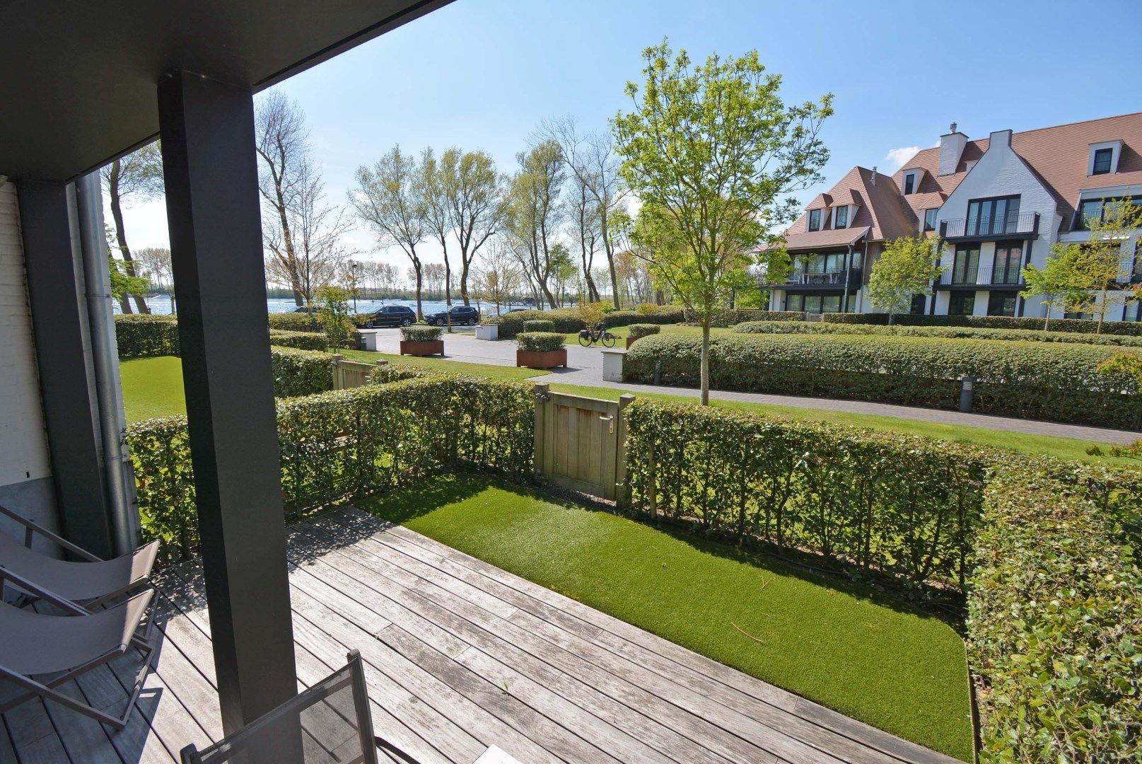 Recent en zonnig tuinappartement aan meer Duinenwater foto {{pictureIndex}}