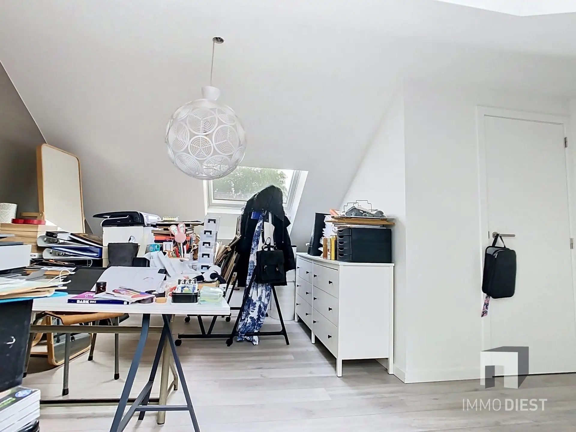 Knappe rijwoning met tuin en terras foto 23