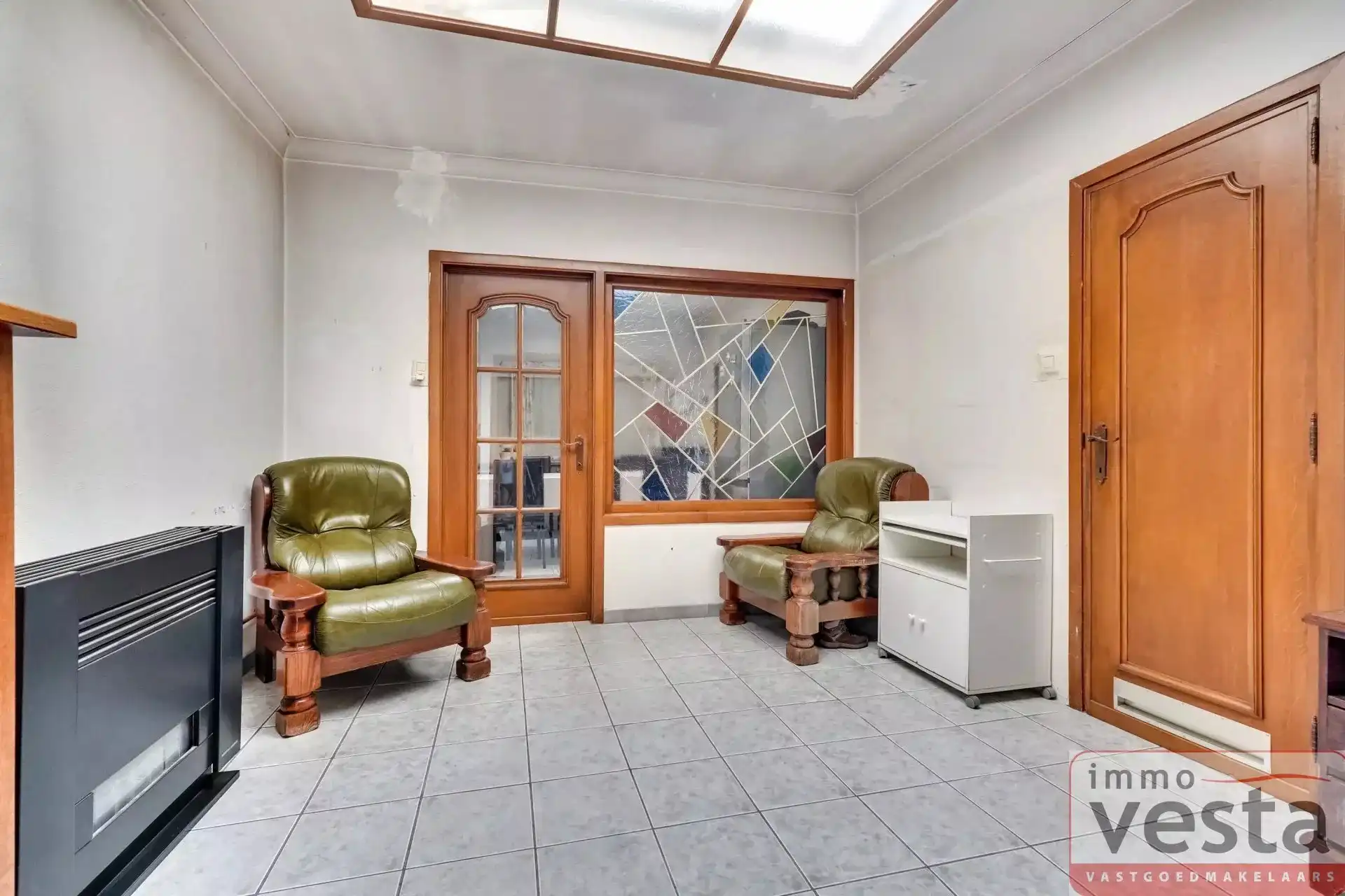 Ruime, te renoveren stadswoning met grote tuin foto 9