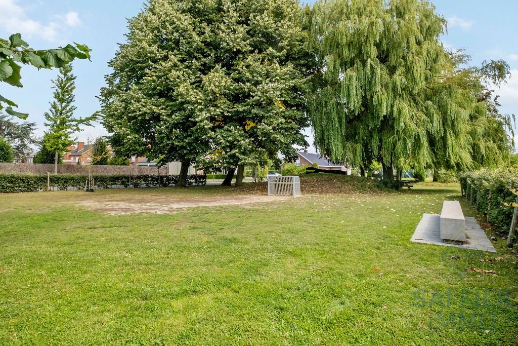 Ruime gezinswoning met zonnige tuin en 5 slaapkamers in hartje Izegem foto 33