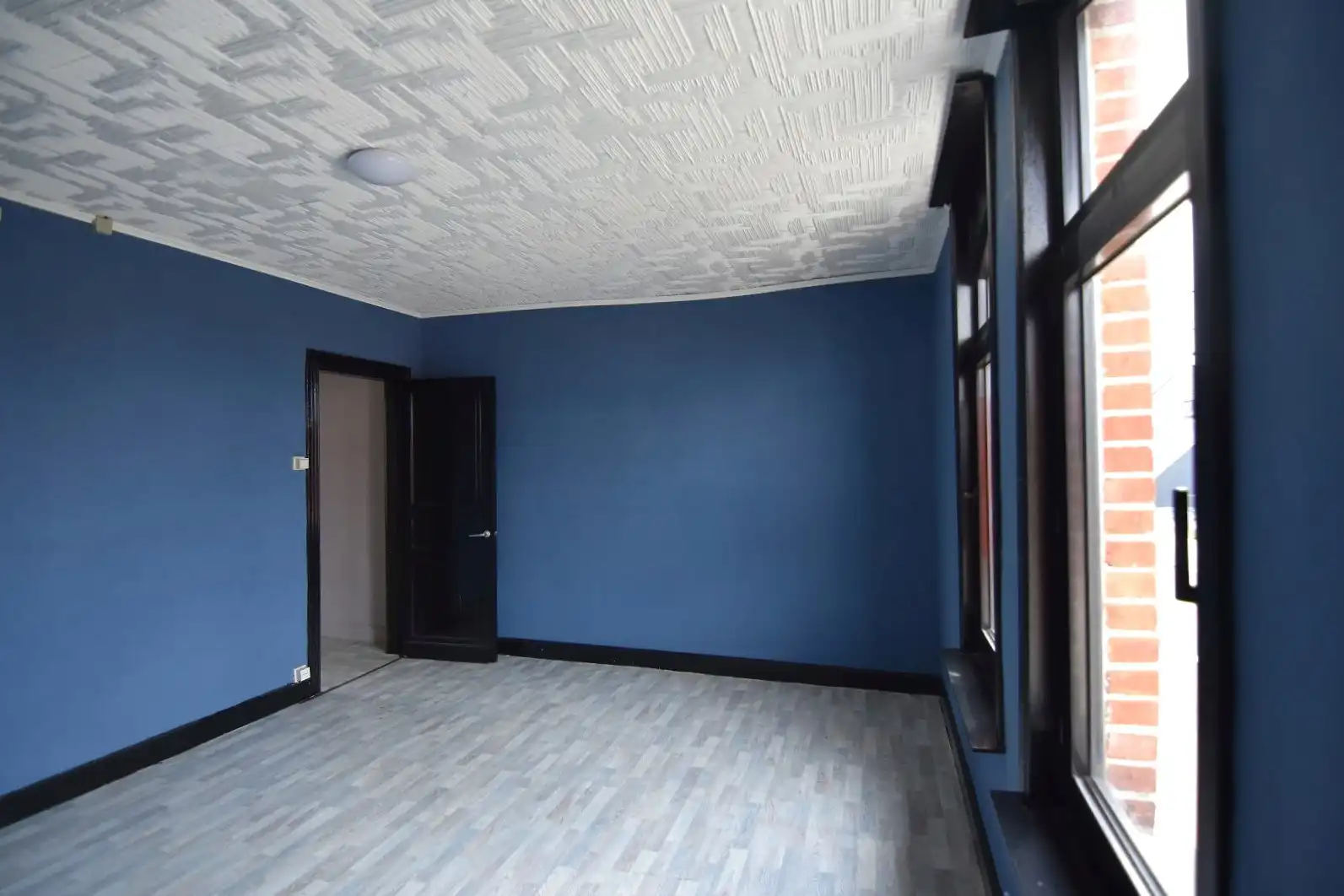 Te renoveren rijwoning met goeie ligging foto 18