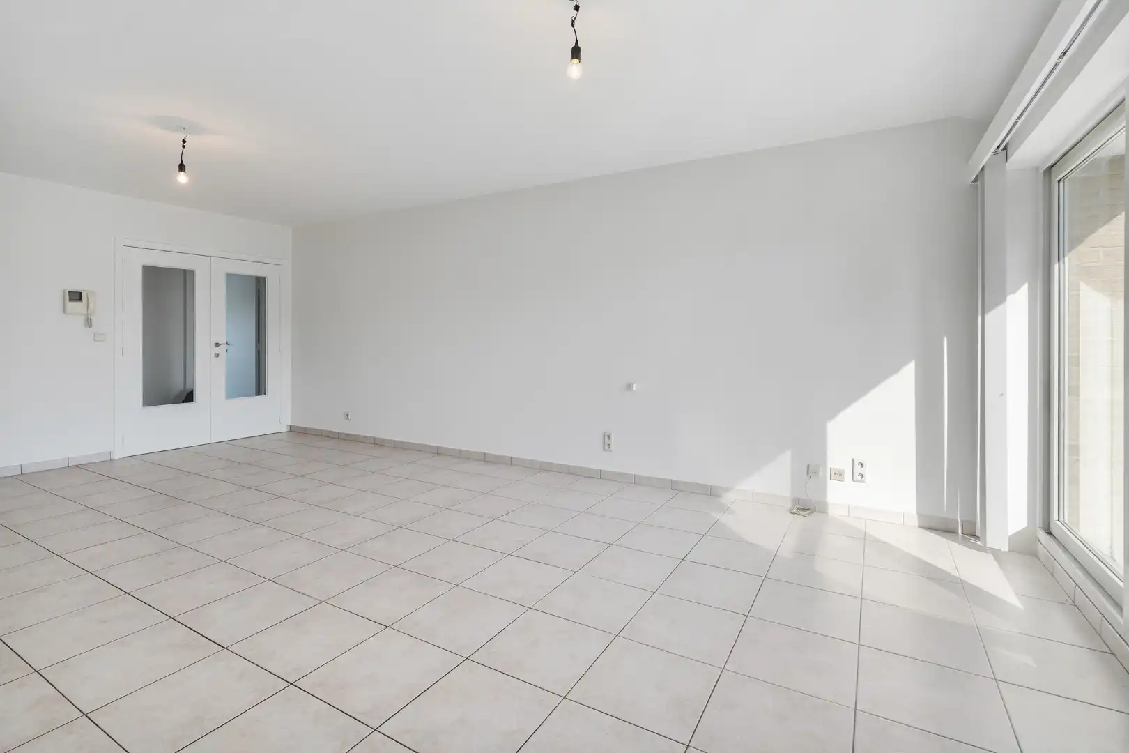 Instapklaar appartement met garagebox aan de markt van Olsene foto 7