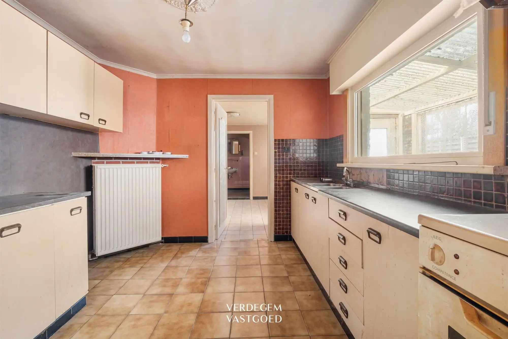 Rustig gelegen woning met 2+2 slaapkamers, tuin en garage, te renoveren foto 7