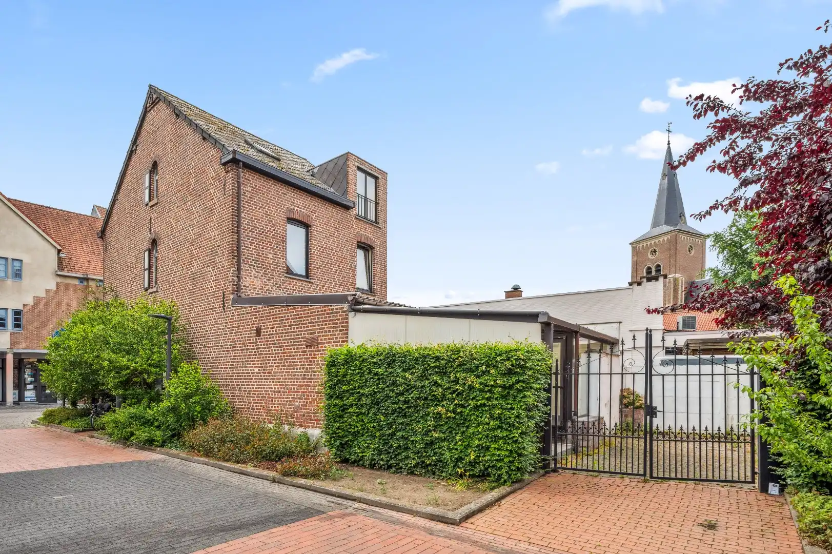 2 vergunde appartementen of 1 huis pal in centrum Herk-de-Stad foto 3