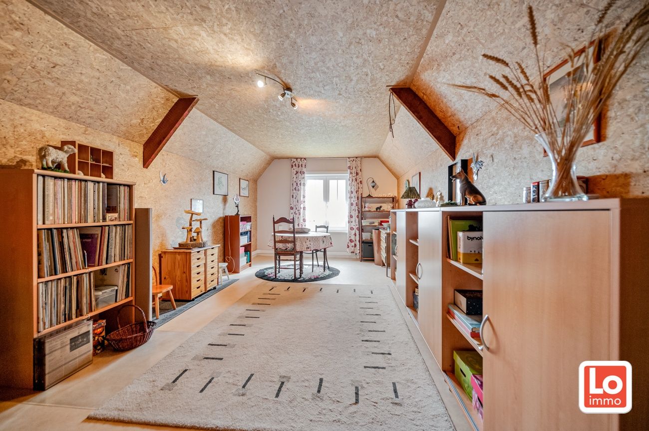 Degelijke alleenstaande woning met inpandige garage gelegen op een strategische locatie vlakbij Beervelde Dorp en het Park van Beervelde! foto 11