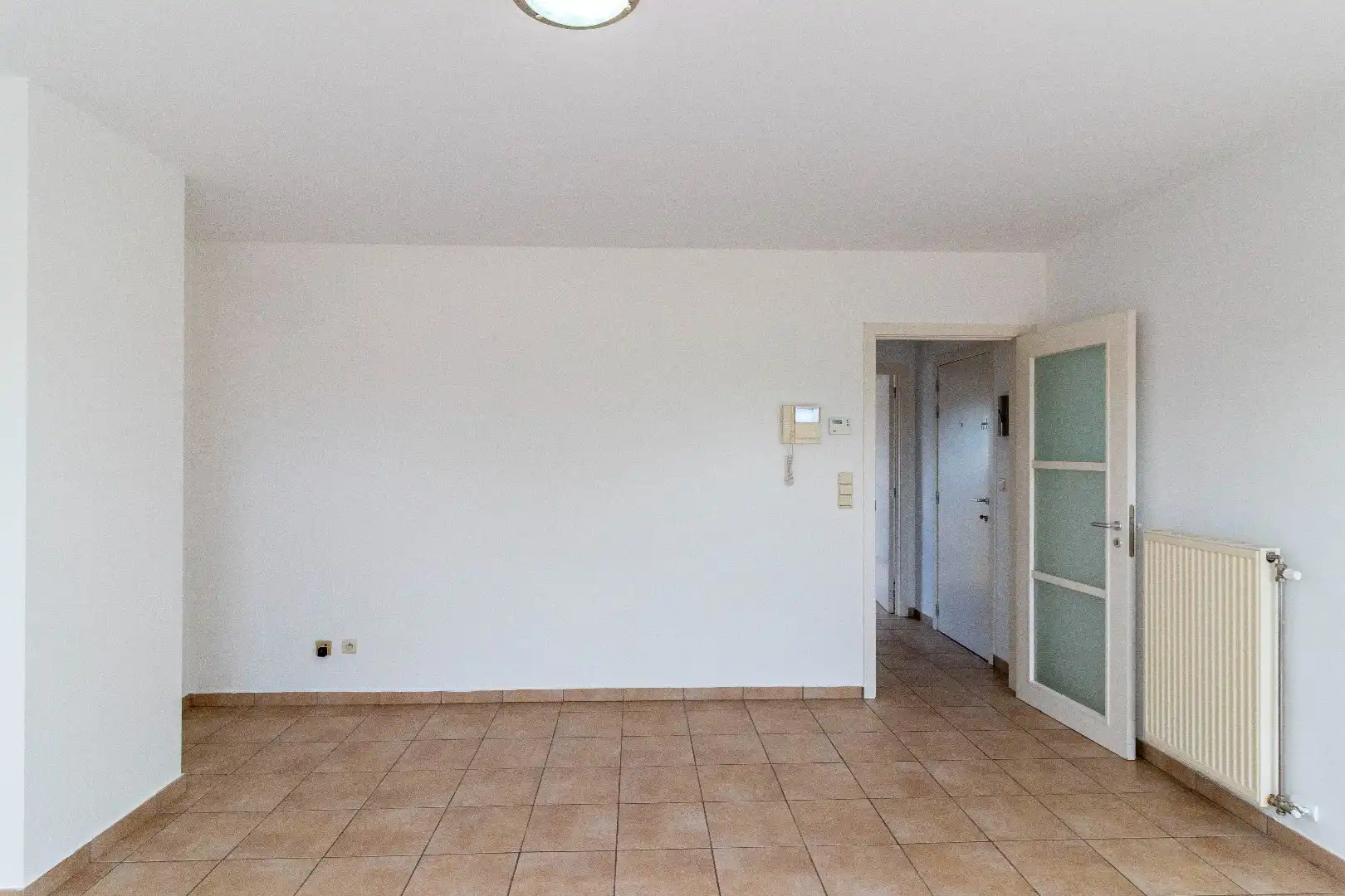 Appartement in het centrum met garage én parkeerplaats! foto 3