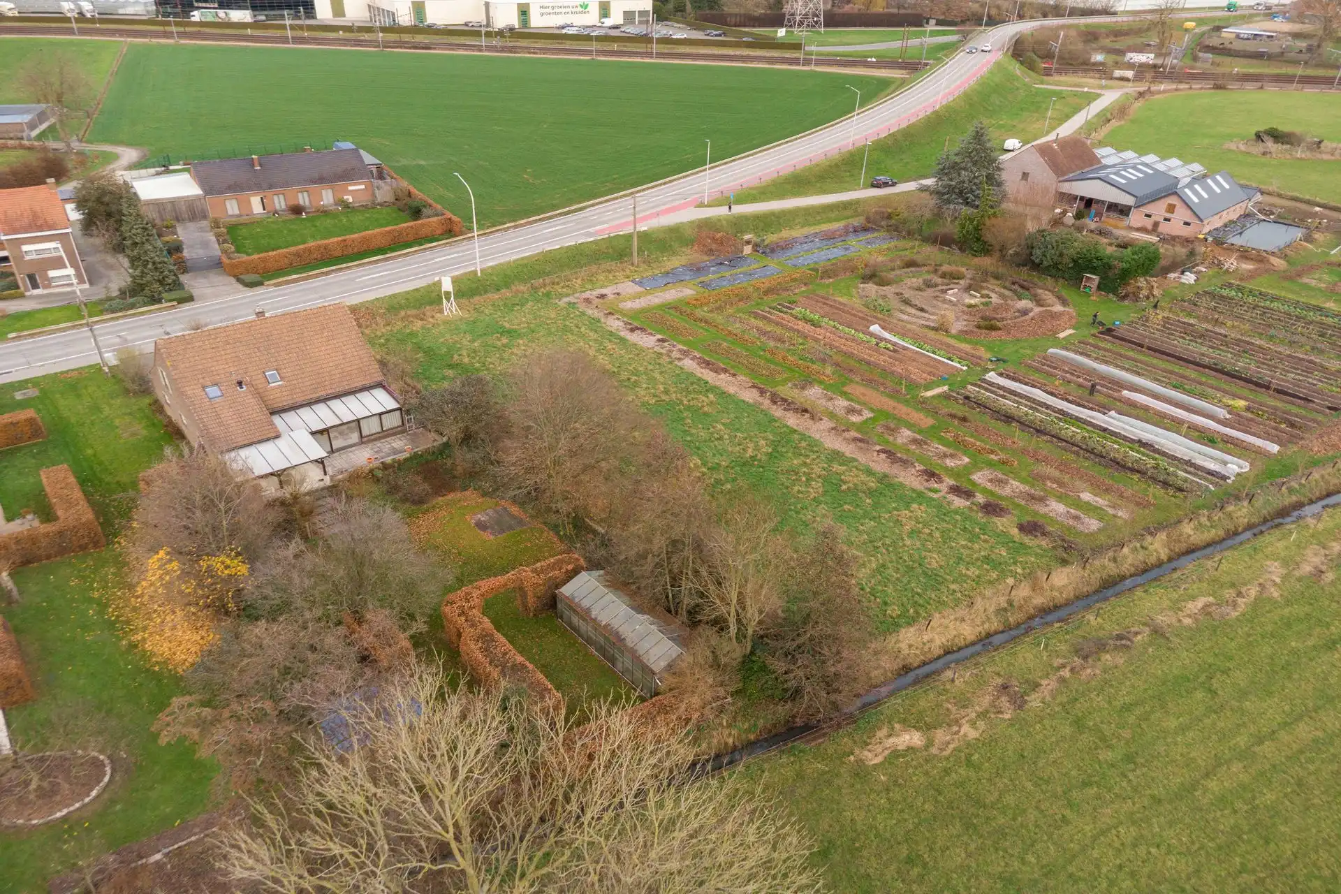 Perceel villagrond van 1083m2 & ZUID-tuin foto 11