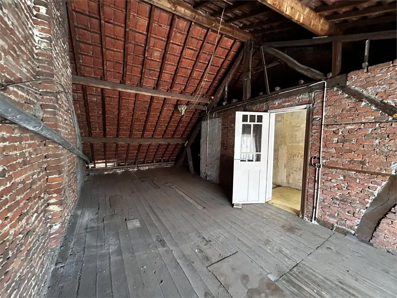 Te renoveren handelshuis met woonst foto 38