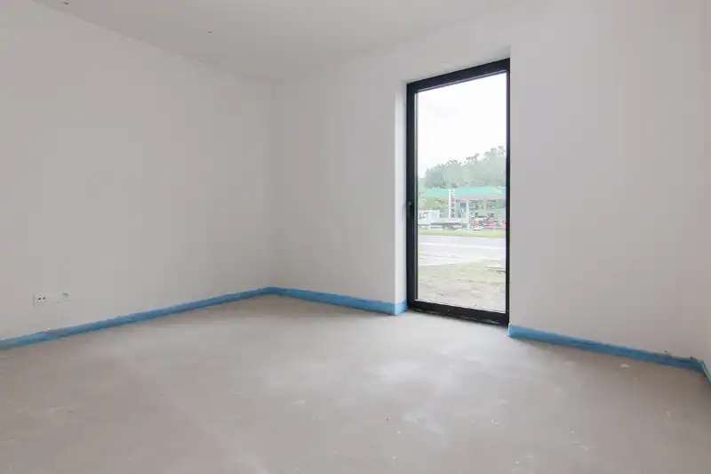 Ruim gelijkvloers nieuwbouwappartement met 4 slaapkamers en 2 badkamers, ruim terras en een mooie tuin op een goed bereikbare locatie! foto 12