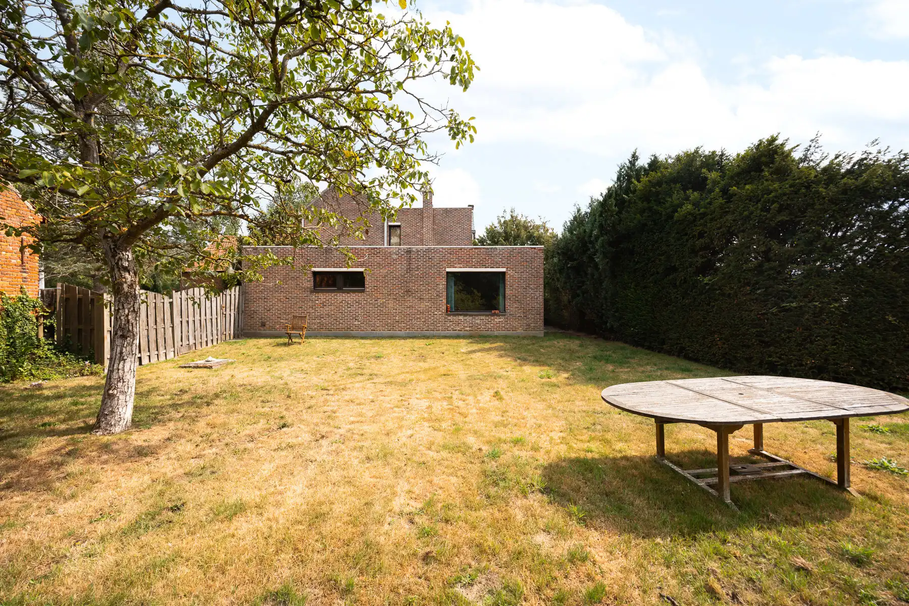 Prachtig groen gelegen renovatiewoning met prachtige tuin foto 18