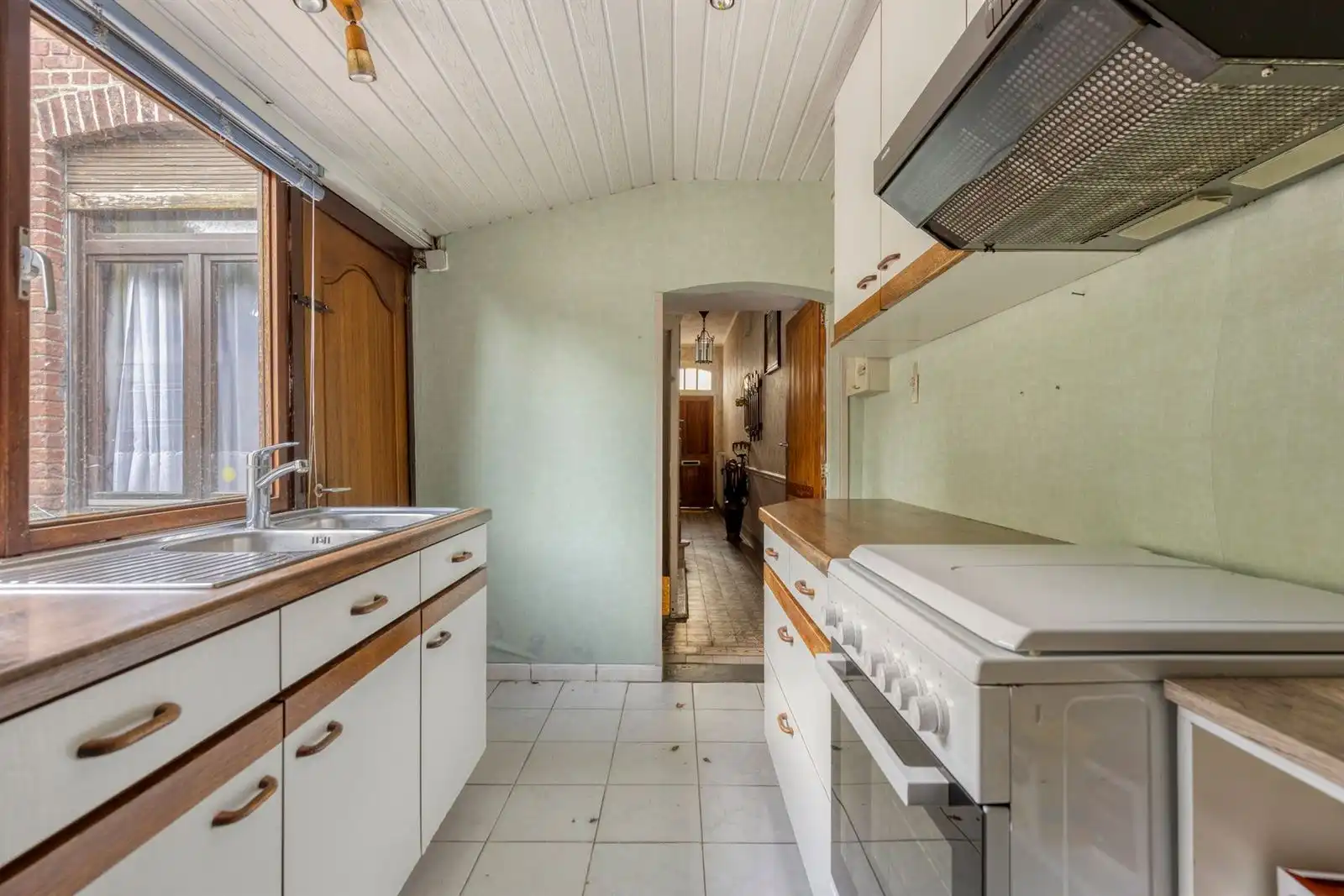 Te renoveren 3-gevelwoning met mogelijks 4 slaapkamers + garage foto 11