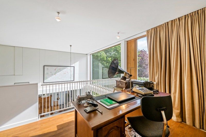 Instapklare architecturale woning met prachtige tuin en uitstekende ligging foto 17