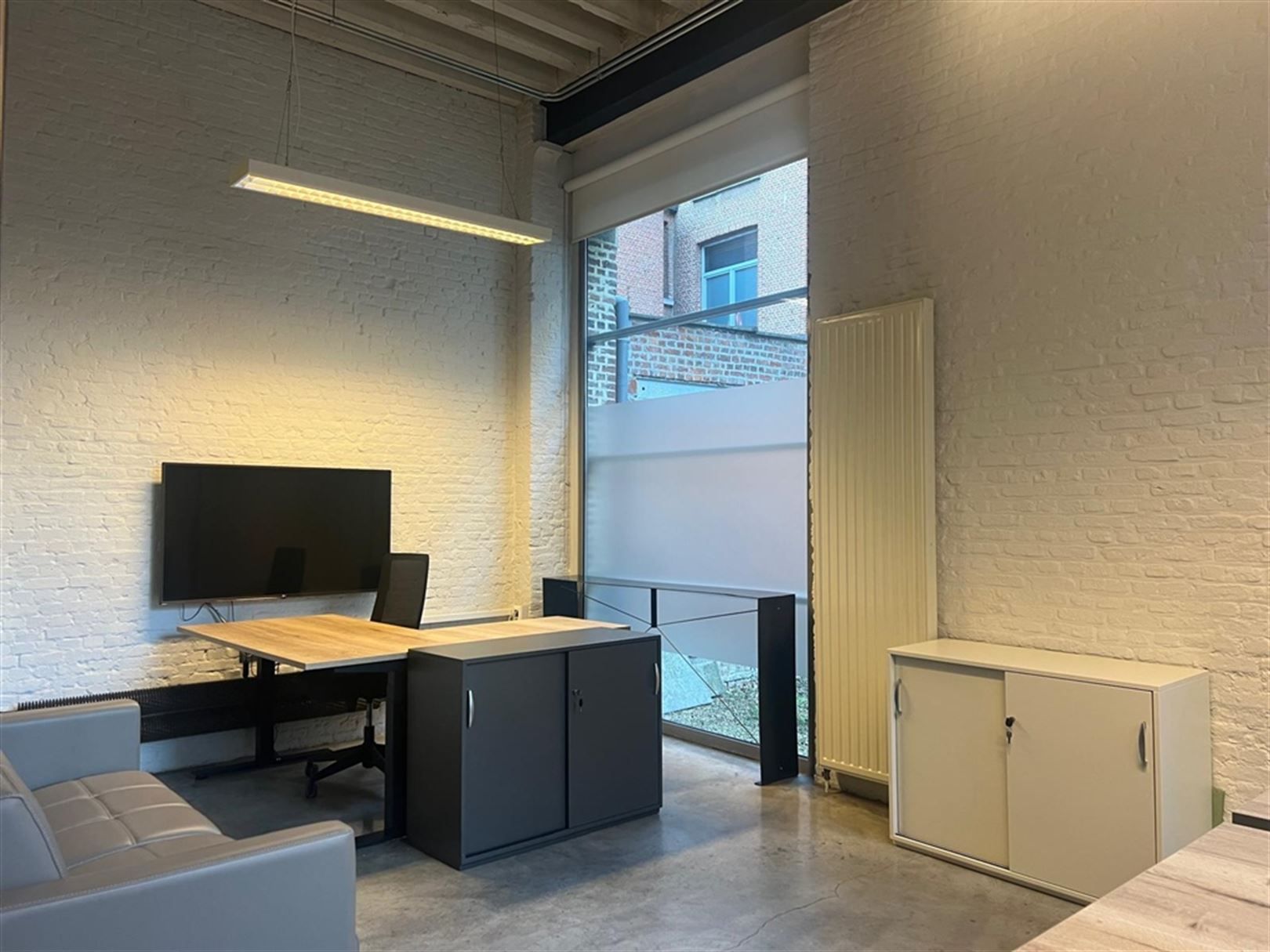 Gelijkvloers loftkantoor iin gerenoveerd pakhuis aan het Eilandje foto 5