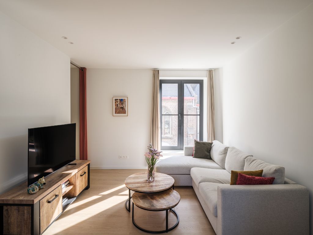 Stijlvol gerenoveerde en instapklare woning met 2 slaapkamers nabij De Visserij – Gent foto {{pictureIndex}}