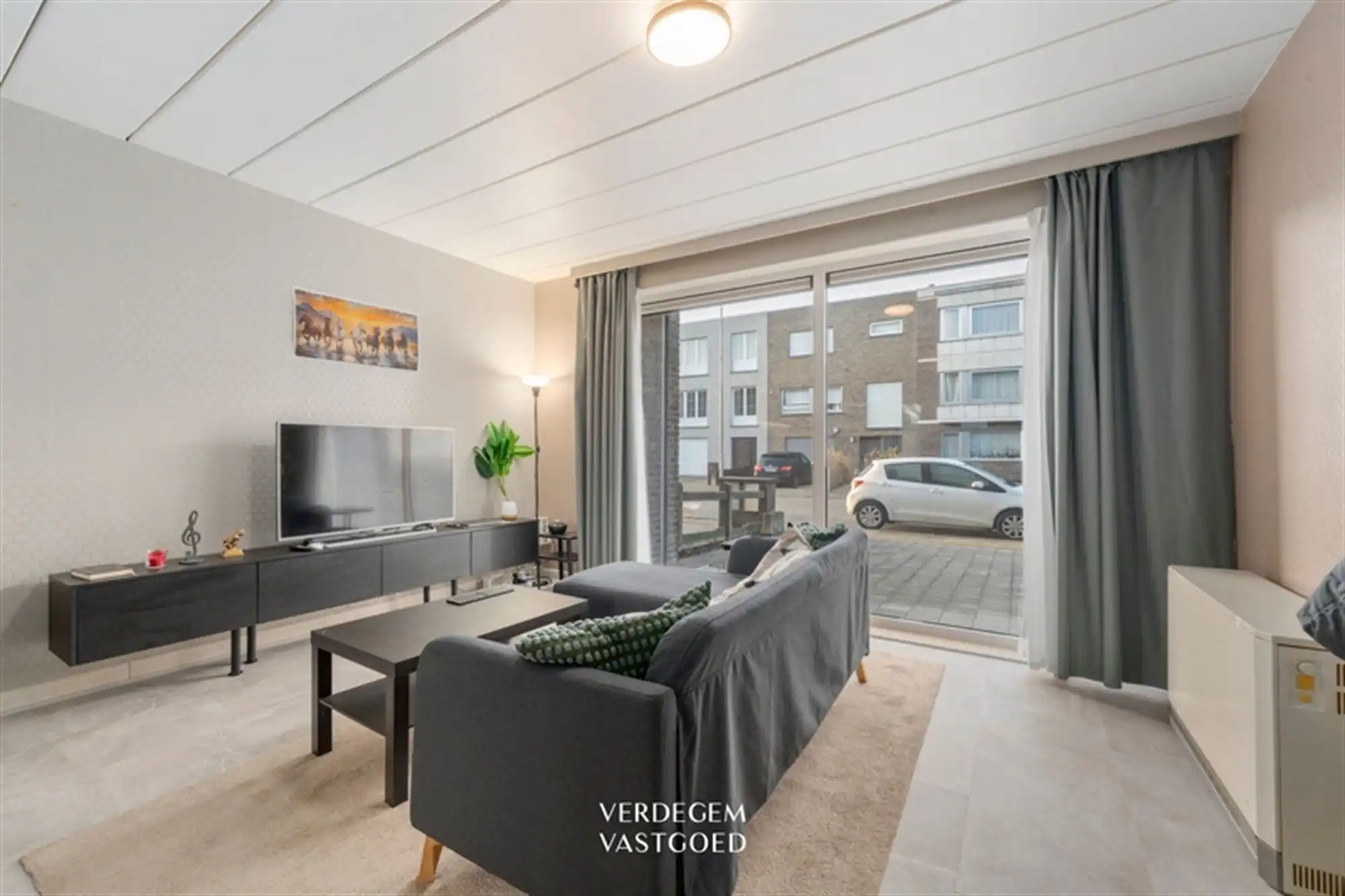 Gelijkvloers appartement met 1 slaapkamer en privatieve tuin  foto {{pictureIndex}}