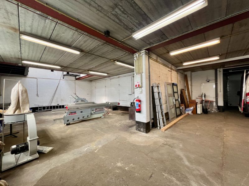 MULTIFUNCTIONEEL PAND MET DUPLEXAPPARTEMENT EN GARAGE foto 6