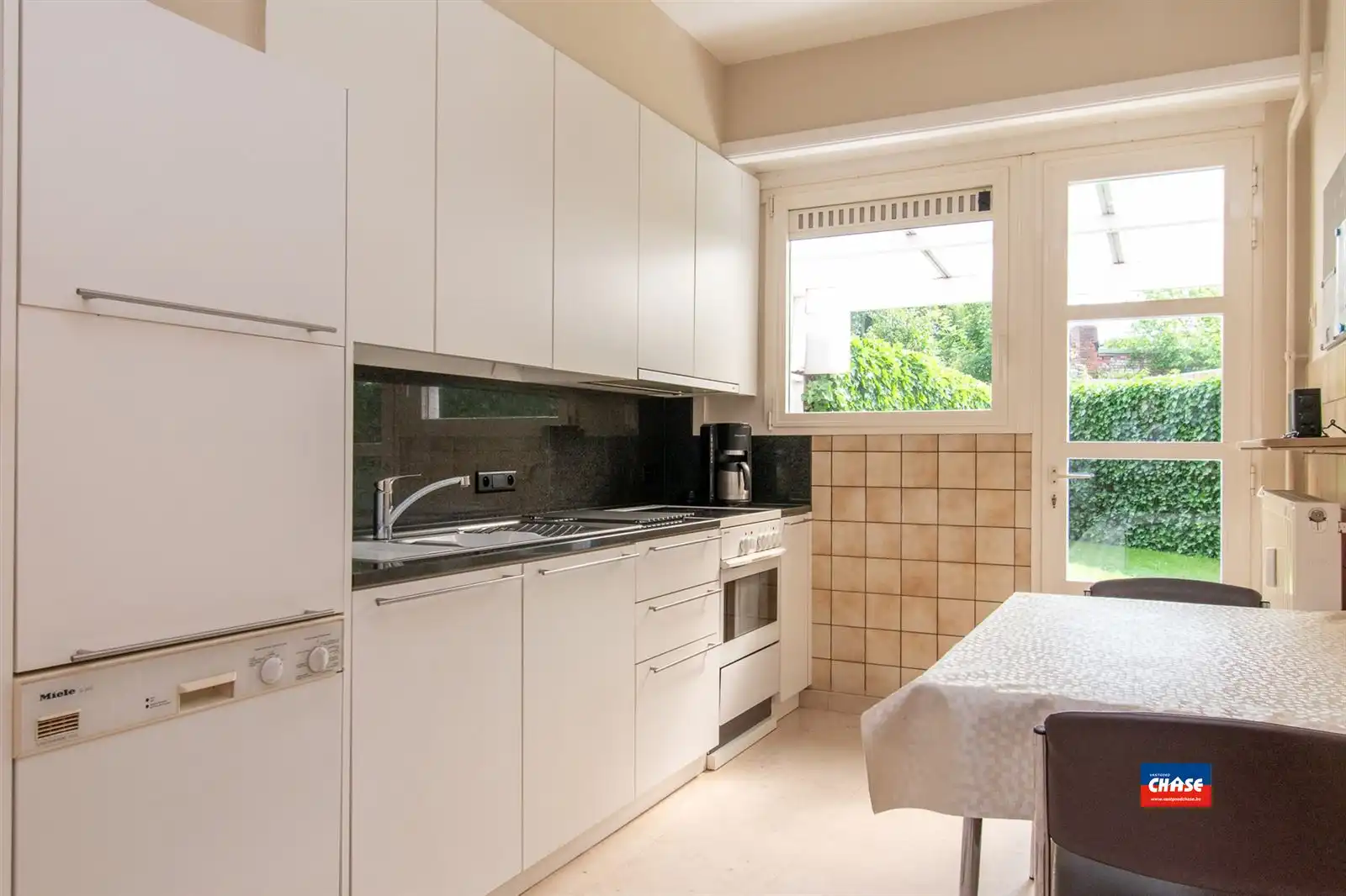 Woonhuis | twee appten + tuin + P  foto 8