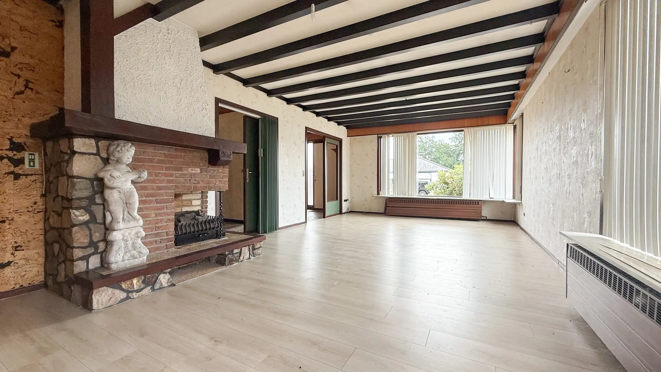 Ruime split-levelwoning met 3 slaapkamers op groot perceel! foto 4